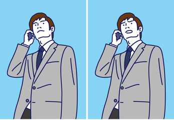 携帯電話で電話するビジネスマン