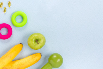 Banner with omega 3 capsules, sports equipment, fruit. Healthy lifestyle concept, weight loss.