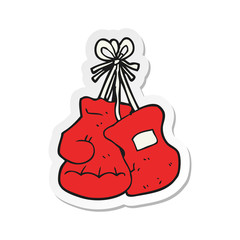 sticker of a cartoon boxing gloves