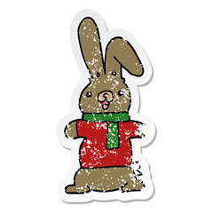 distressed sticker of a cartoon rabbit