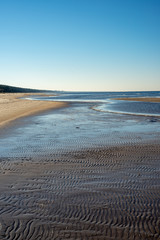 empty sandy beach by the sea