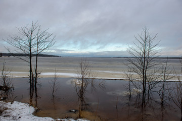 frozen bodies of water in deep winter under snow