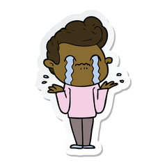 sticker of a cartoon man crying