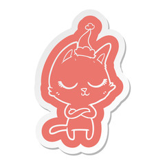 calm cartoon  sticker of a cat wearing santa hat