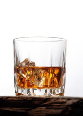 Glasses of scottish whiskey with ice cubes