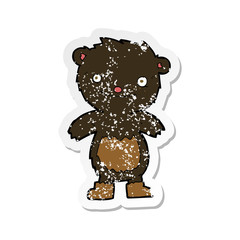 retro distressed sticker of a cartoon teddy black bear wearing boots
