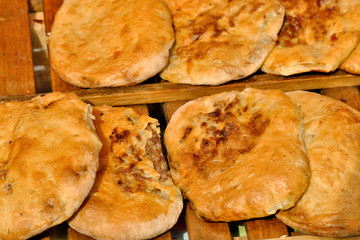 Meat pies grilled outdoors