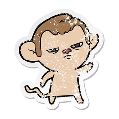 Fototapeta premium distressed sticker of a cartoon annoyed monkey