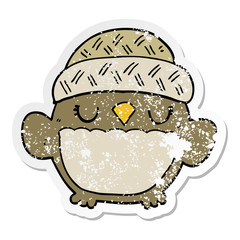 distressed sticker of a cute cartoon owl in hat