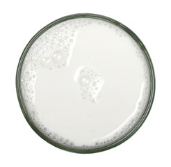 Glass of milk with bubbles isolated on white background, top view, clipping path 