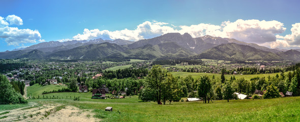 Panorama Beautiful spring nature. Fresh air, gentle mountains, warm rays of the sun.
