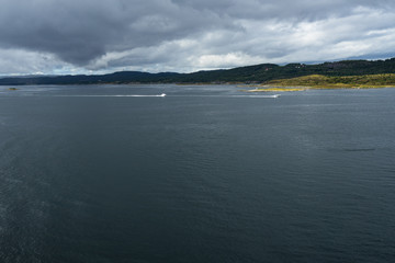 Two speedboats in the scenery landscape of Western Norway coastline