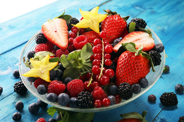 salad with fresh fruits and berries. healthy spring fruit salad  with strawberries