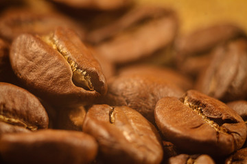 Coffee flavored roasted grain close-up, brown color.