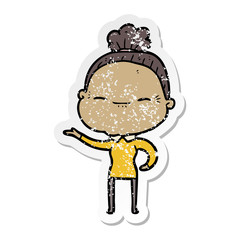 distressed sticker of a cartoon peaceful old woman