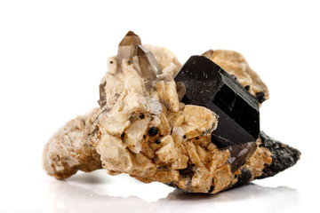 macro mineral stone schorl, black tourmaline on white background
