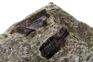 macro mineral stone schorl, black tourmaline on white background