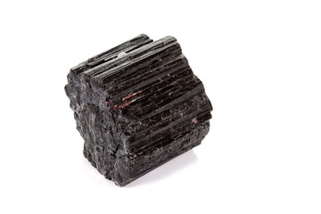 macro mineral stone schorl, black tourmaline on white background