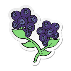 sticker of a cartoon blueberries