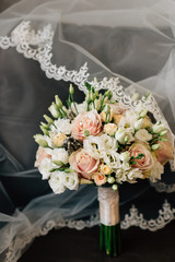 wedding details - veil, bouquet and boutonniere