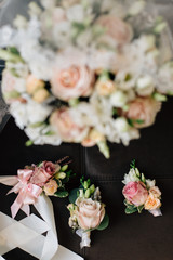 wedding details - veil, bouquet and boutonniere