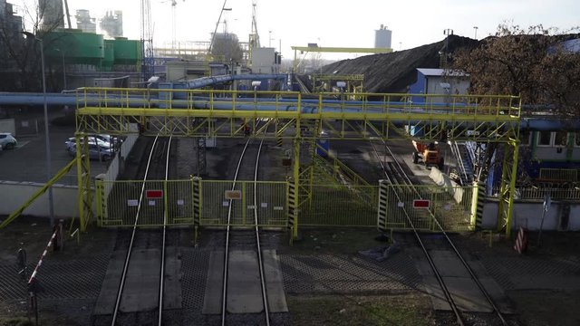 Shady downtown railway track of Zeran, in a industrial area of Warsaw capital Poland