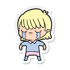 sticker of a cartoon woman crying