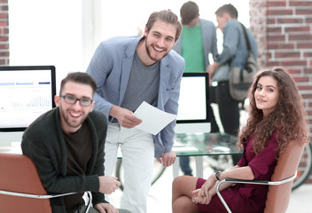 Obraz premium friendly business team talking in the office