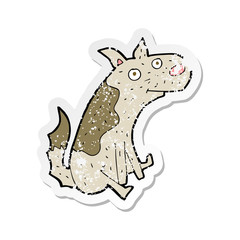 retro distressed sticker of a cartoon sitting dog
