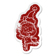 cartoon distressed sticker of a happy old woman wearing santa hat