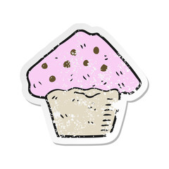 retro distressed sticker of a cartoon strawberry muffin