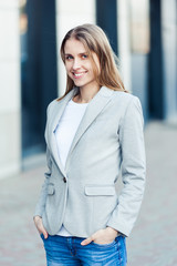 Blonde young smiling businesswoman