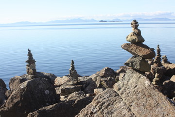 Fototapeta na wymiar piles of rocks in Scotish Lake, Scotland