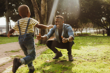 Son running into father's embrace