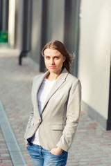 Portrait of beautiful smiling blonde young woman 
