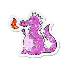 retro distressed sticker of a cartoon fire breathing dragon