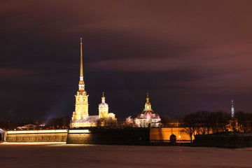 Peter and Paul Fortress of St. Petersburg, Russia in the evening or in the night and Neva river...