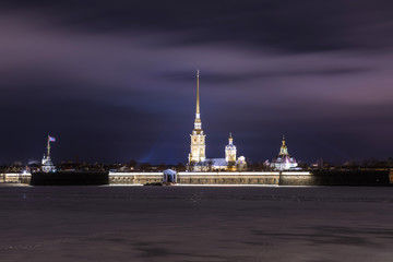 Peter and Paul Fortress of St. Petersburg, Russia in the evening or in the night and Neva river...