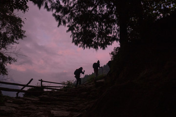 Tourists silhouettes during a hike