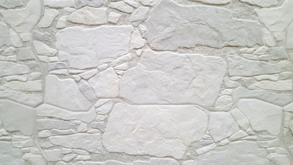 Fragment of a wall made from white stones