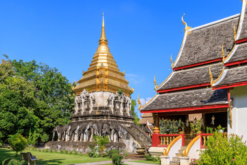 Fototapeta na wymiar Chapel and golden pagoda at Wat Chiang Man in Chiang Mai, North of Thailand