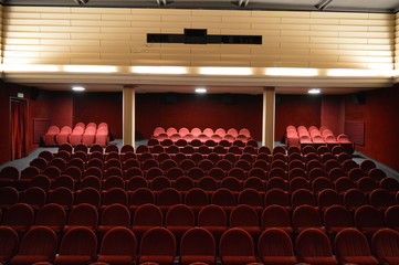 Red seats in cinema theater, Rialto, Poznań, Poland