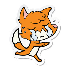 sticker of a crying fox cartoon