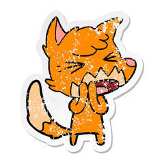 distressed sticker of a angry cartoon fox