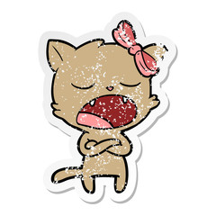 distressed sticker of a annoyed cartoon cat