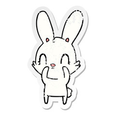 distressed sticker of a cute cartoon rabbit