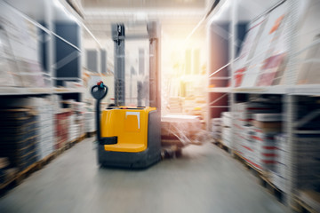 Warehouse industrial premises for storing materials and wood, forklift. Concept logistics,...