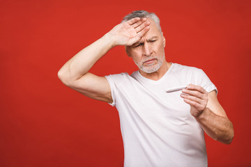 Sick senior man with thermometer having flu, allergy, germs, co