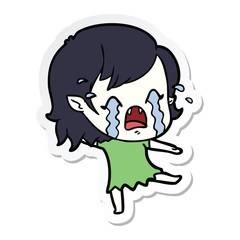 sticker of a cartoon crying vampire girl