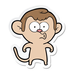 Obraz na płótnie Canvas sticker of a cartoon hooting monkey